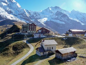 High angle view of houses against mountains