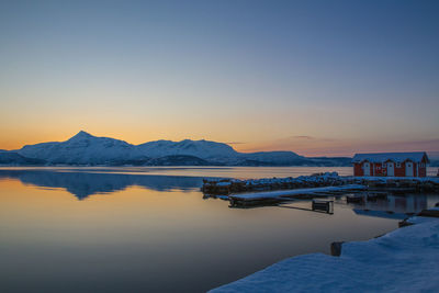 Scenic view of sea against clear sky during sunset