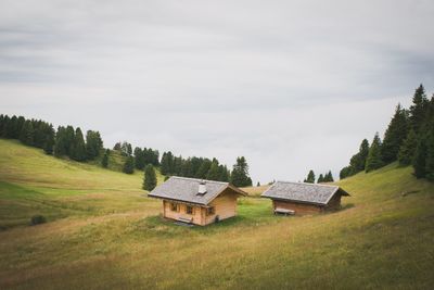 House on field against sky