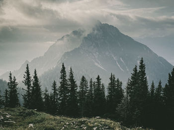 Scenic view of mountains against sky during winter