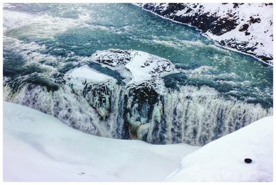 Scenic view of frozen lake against mountain