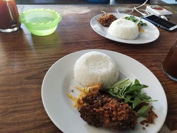 High angle view of breakfast served on table