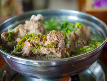 Close-up of meat in bowl on table