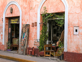 Chairs and table by window