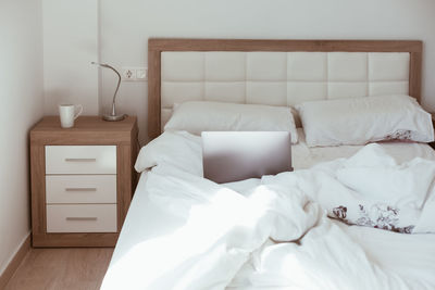 White bed in bedroom