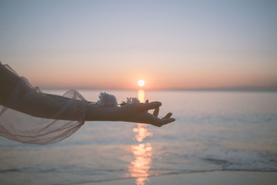 Scenic view of sea against sky during sunset