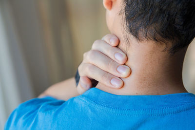 Close-up of boy with hands