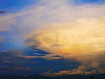 Low angle view of clouds in sky during sunset