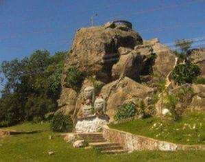 Scenic view of rock formation against sky