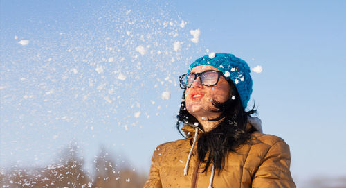 Portrait of woman in snow