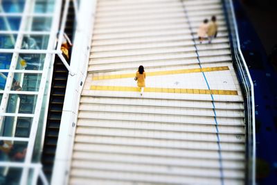 High angle view of person walking on steps