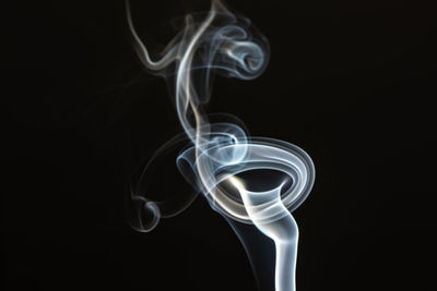 Close-up of smoke against black background