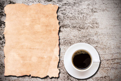 High angle view of coffee cup on table