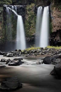 Scenic view of waterfall in forest