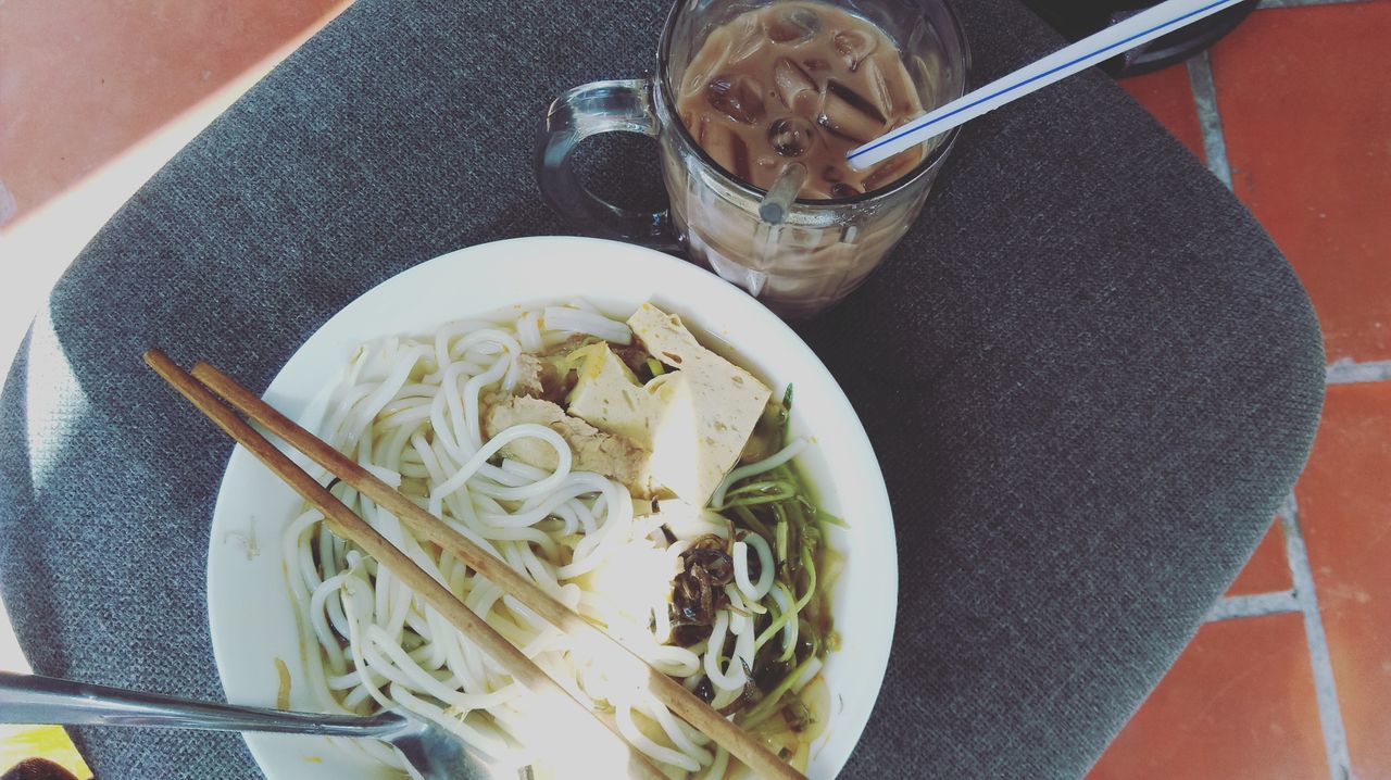 food and drink, noodles, bowl, freshness, table, food, high angle view, indoors, healthy eating, noodle soup, ready-to-eat, serving size, no people, spaghetti, soup, chopsticks, close-up, day