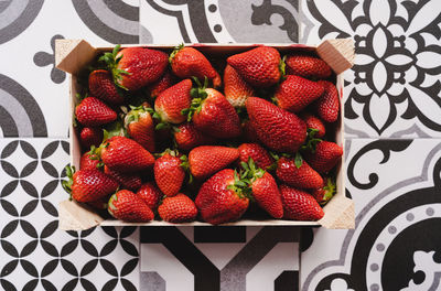 High angle view of strawberries on table