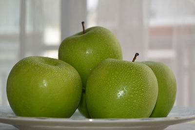 Close-up of apples on table