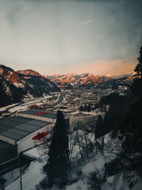 Scenic view of snowcapped mountains against sky during winter