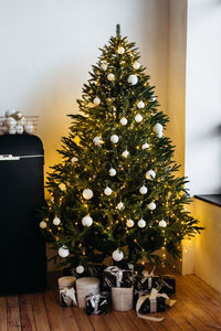 Christmas tree on table at home