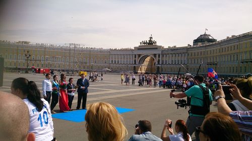 Group of people in front of building