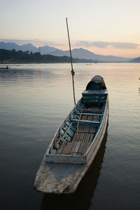 Scenic view of river against sky during sunset