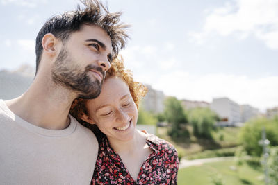 Portrait of happy young couple