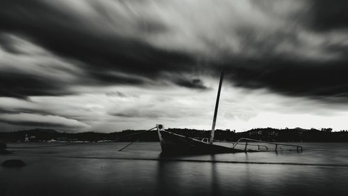 View of river against cloudy sky