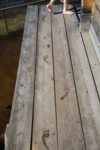Low section of people on pier