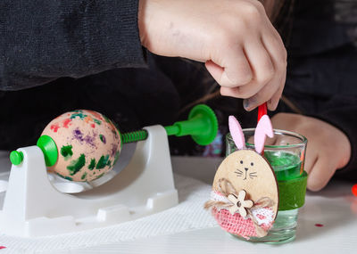 Close-up of hand holding ice cream