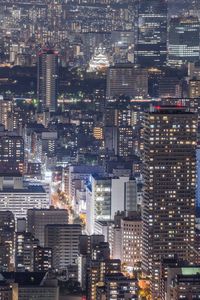 High angle view of illuminated buildings in city