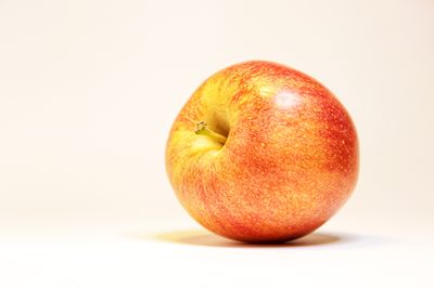 Close-up of apple against white background