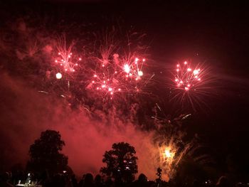 Firework display at night