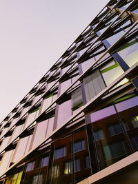 Low angle view of modern building against clear sky