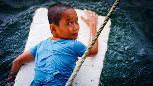 Portrait of boy in water