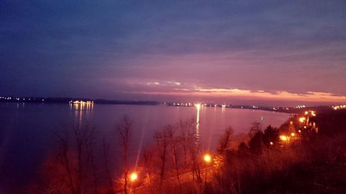 Scenic view of lake at sunset