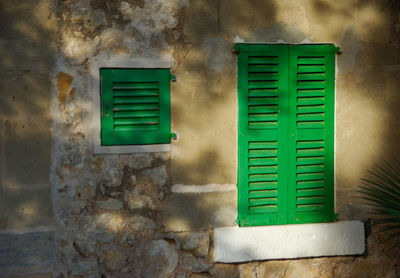 Close-up of closed window on wall
