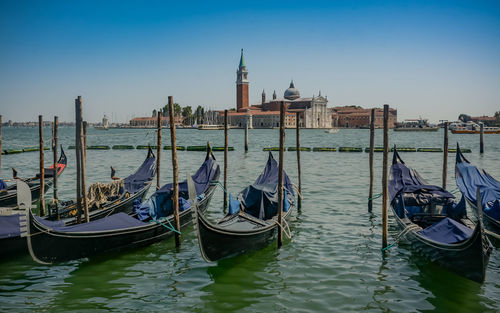 Boats moored in canal