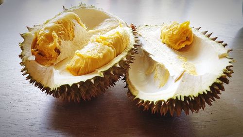 High angle view of split opened tropical fruit durian