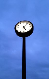 Low angle view of clock