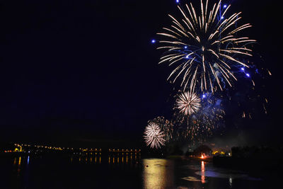 Firework display at night