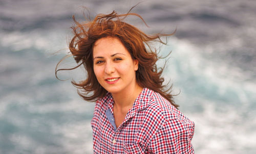 Portrait of smiling young woman