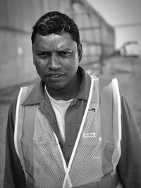 Portrait of man wearing reflective clothing