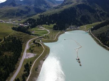 High angle view of river amidst mountains