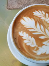 High angle view of coffee on table