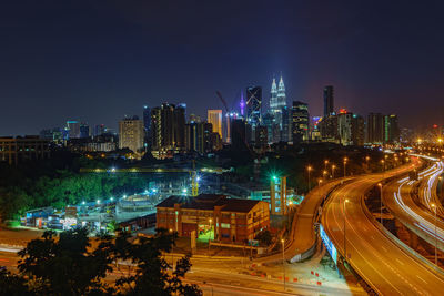 High angle view of illuminated city at night