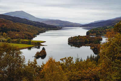 Scenic view of lake against sky during autumn