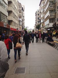 People walking on street in city