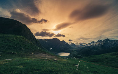 Scenic view of mountains against sky during sunset