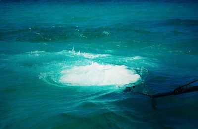 Close-up of blue sea against sky