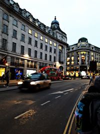 People on street in city